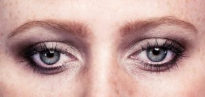 What causes watery eyes (epiphora)?